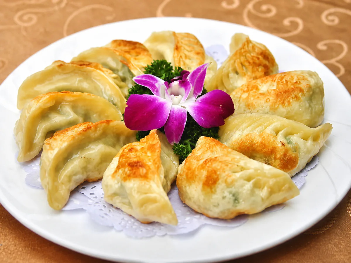 Ravioli dorati alla piastra